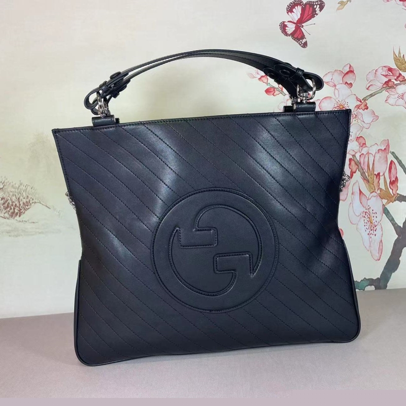 G*u*i top handle bags